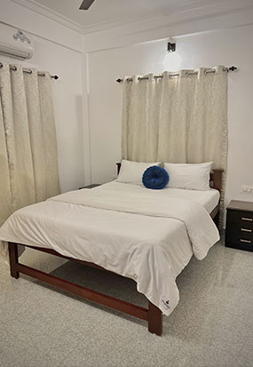 Maraga Inn bedroom with comfortable beds